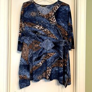 Animal print tunic with silver embellishments. Like new. Size 1X